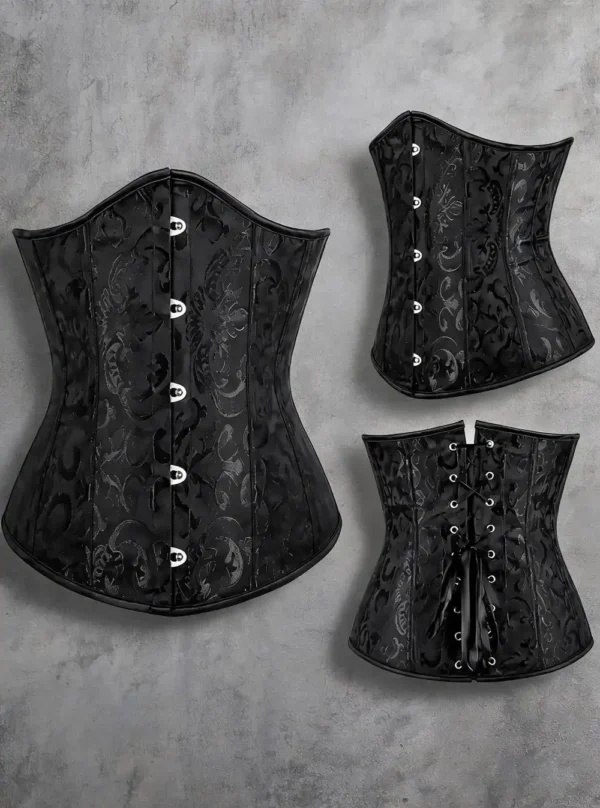 Serre-taille noir brodé, vues face, trois-quarts et dos sur fond béton, détail buscs acier et laçage arrière