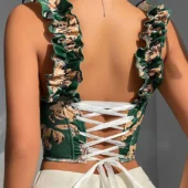 Bustier Laurie vert, vue de dos soulignant le laçage corset et les détails floraux.