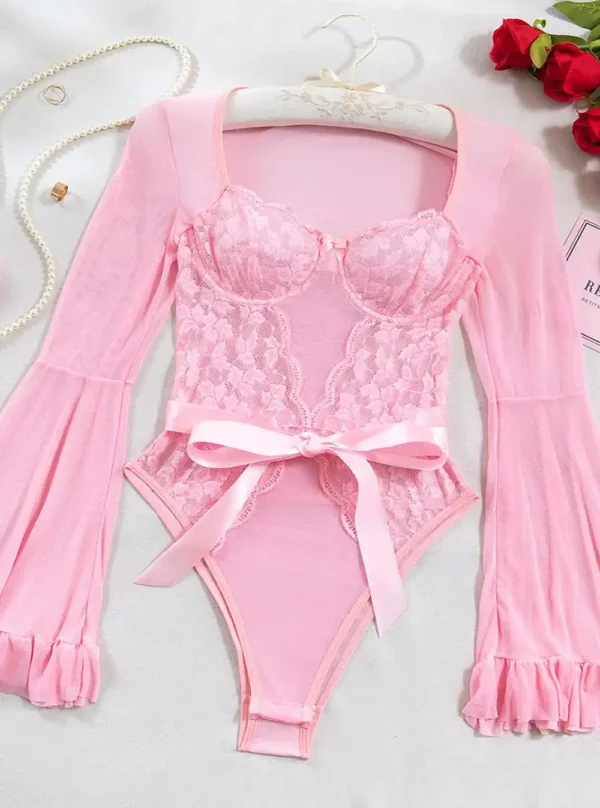Body manches longues bouffantes rose à plat.